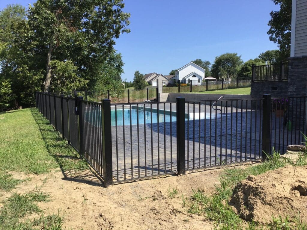 metal security fence around a swimming pool