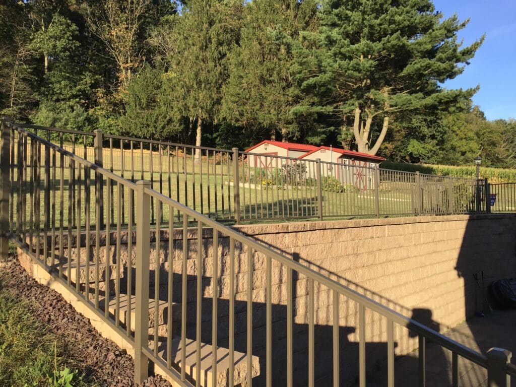 metal safety fence along a retaining wall