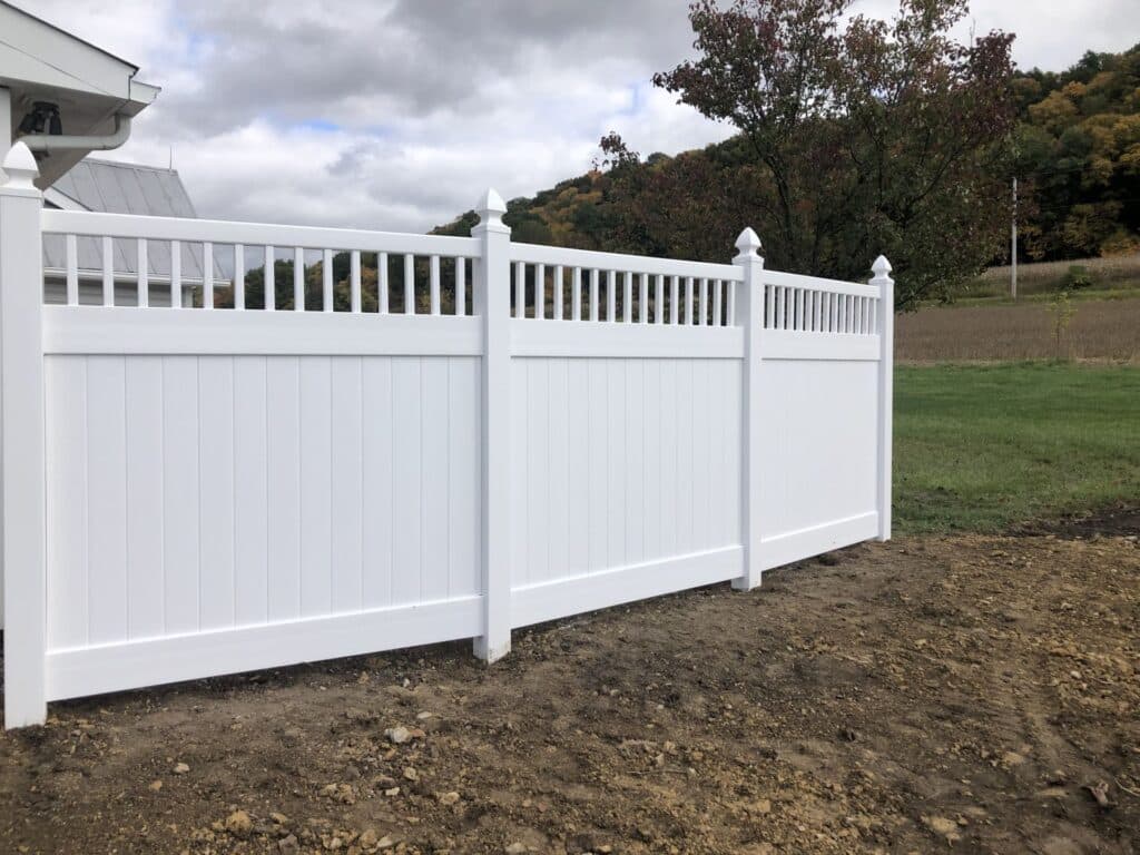 vinyl privacy fence around a residence